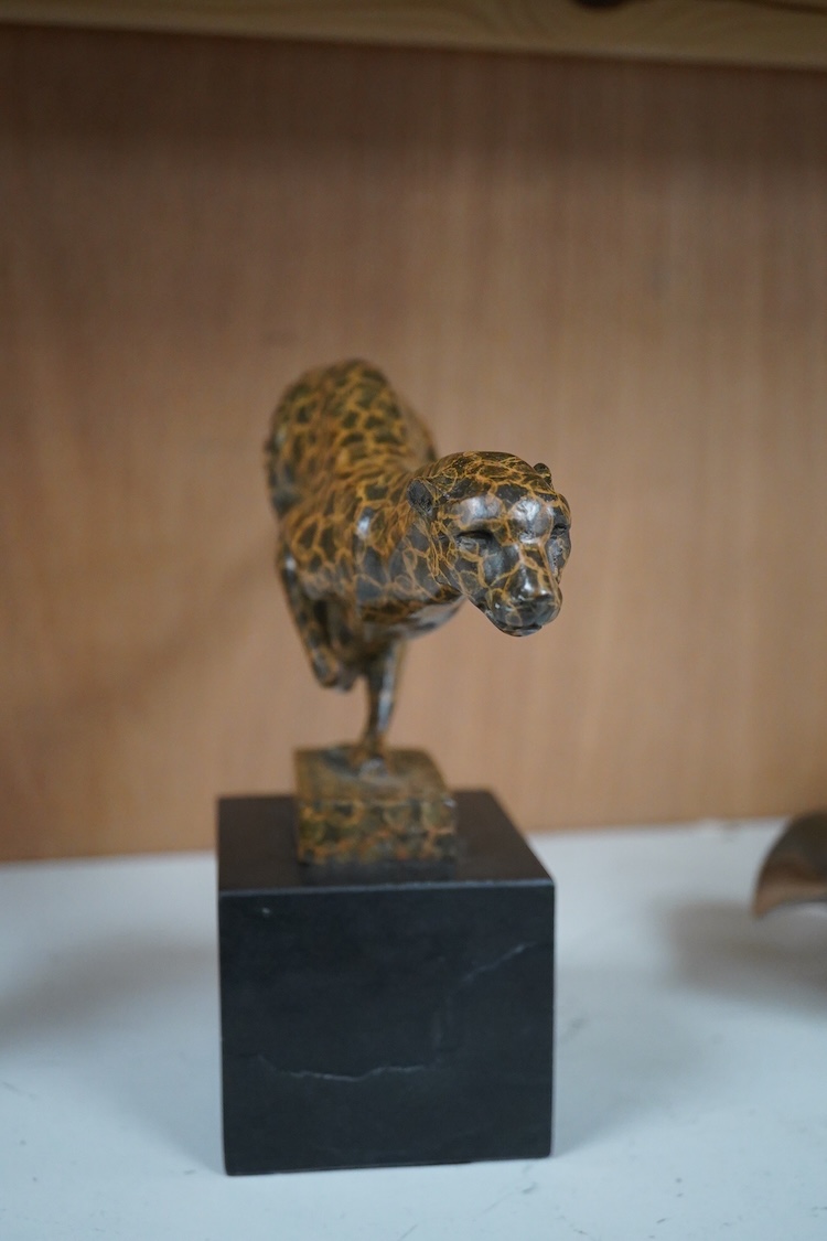 A patinated bronze cheetah bearing J.B. Depose foundry stamp, on slate plinth, 19cm high